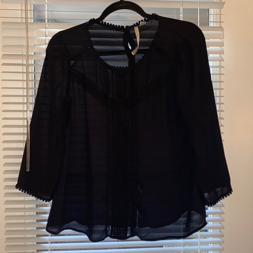 Black blouse in size M by Lauren Conrad